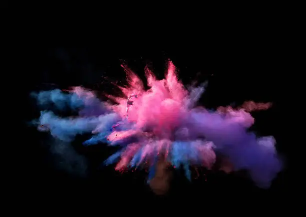 Fantastic forms of powder paint and flour combined  together
explode in front of a black background to give off fantastic 
color explosions in bizarre multi colored cloud forms.