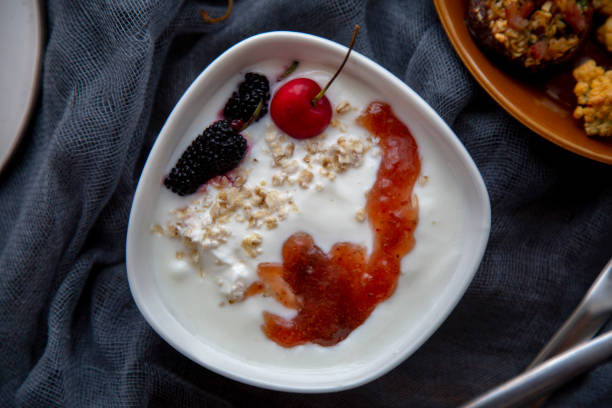 homemade yogurt with jam and cereal
