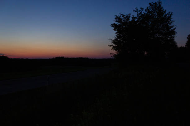 istock colorful darkness sunset sky 1154528975