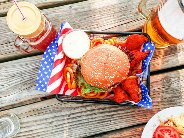 istock Hamburger with nuggets on twisted french fries 1154534062