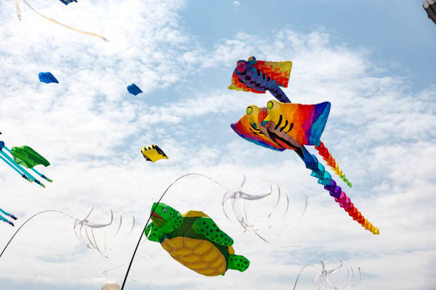 istock Kites with blue sky and white clouds 1154535025