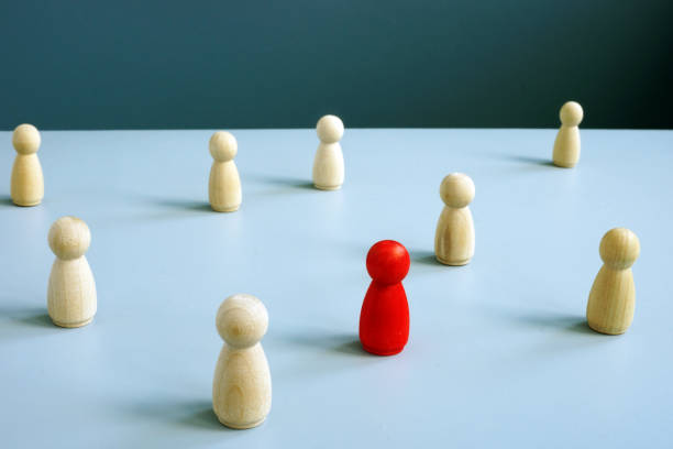 istock Individuality concept. Different and unique red figurine. 1154537191