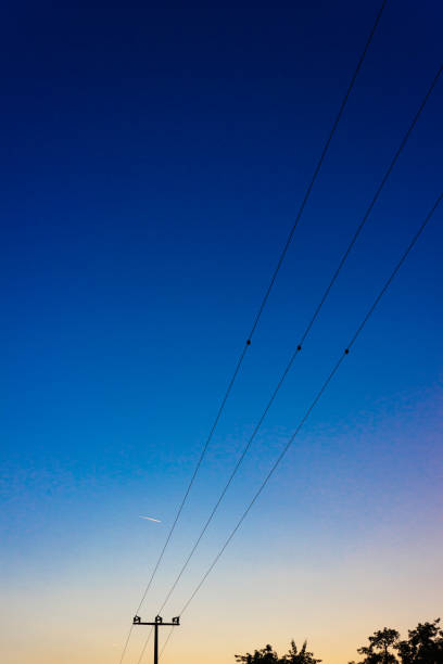 istock telegraph pole at colorful sunset 1154540494
