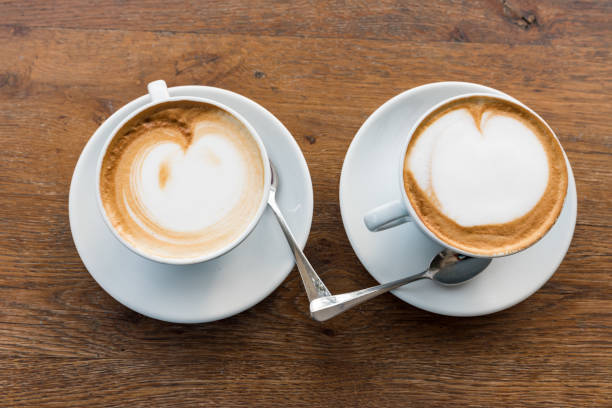 istock Pair of cappuccinos with heart 1154540615