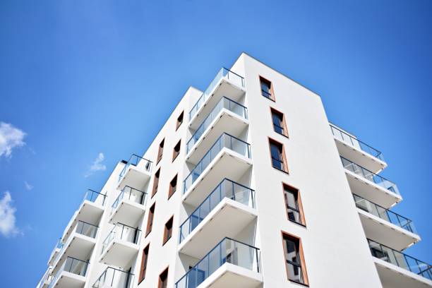 istock Modern apartment buildings on a sunny day with a blue sky. 1154541775