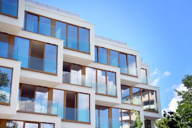 istock Modern apartment buildings on a sunny day with a blue sky. 1154541830