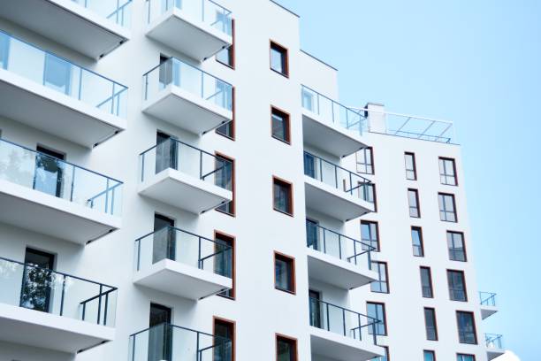 istock Modern apartment buildings on a sunny day with a blue sky. 1154542428