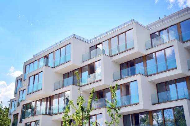 istock Modern apartment buildings on a sunny day with a blue sky. 1154542600