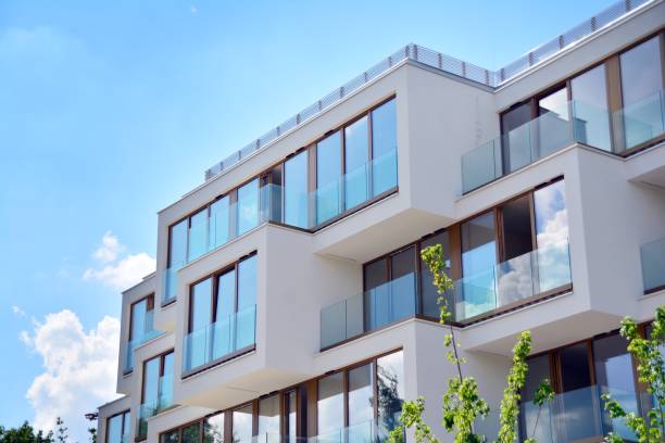 istock Modern apartment buildings on a sunny day with a blue sky. 1154542620