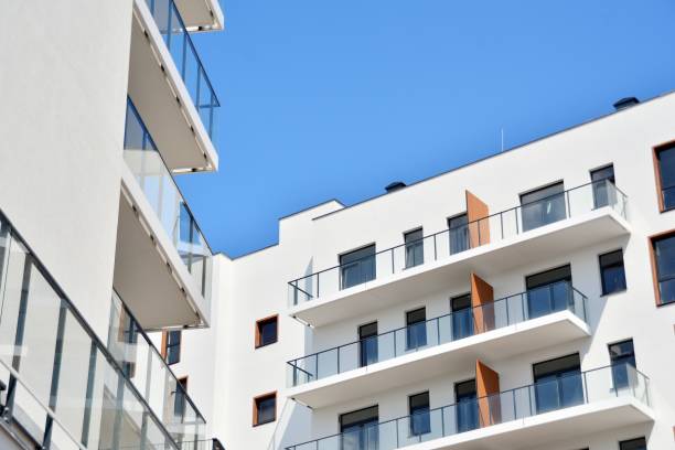 istock Modern apartment buildings on a sunny day with a blue sky. 1154542708