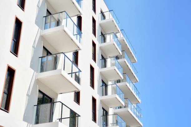 istock Modern apartment buildings on a sunny day with a blue sky. 1154542713