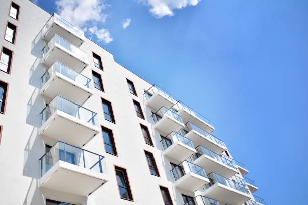 istock Modern apartment buildings on a sunny day with a blue sky. 1154542828