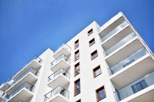 istock Modern apartment buildings on a sunny day with a blue sky. 1154542855