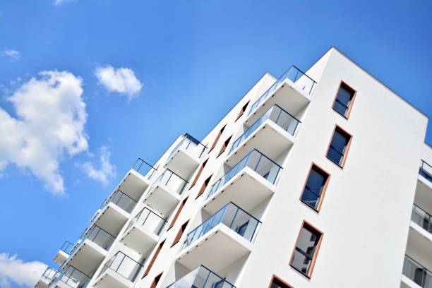 istock Modern apartment buildings on a sunny day with a blue sky. 1154542861