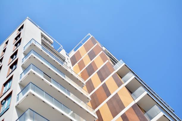 istock Modern apartment buildings on a sunny day with a blue sky. 1154542881