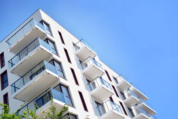 istock Modern apartment buildings on a sunny day with a blue sky. 1154543456