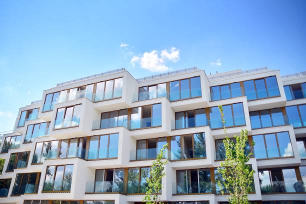 istock Modern apartment buildings on a sunny day with a blue sky. 1154543472