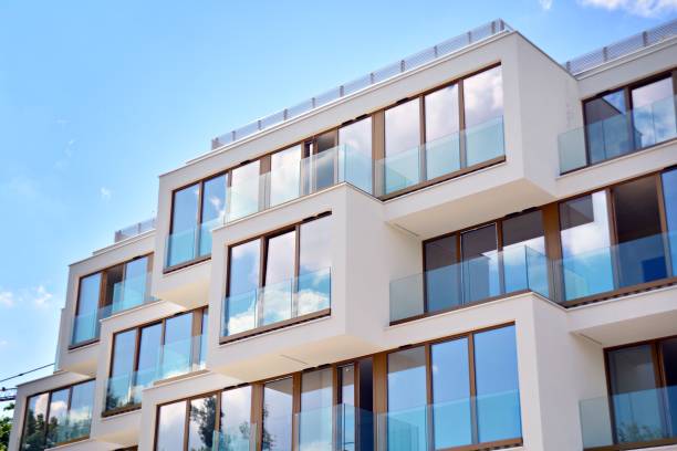 istock Modern apartment buildings on a sunny day with a blue sky. 1154543513