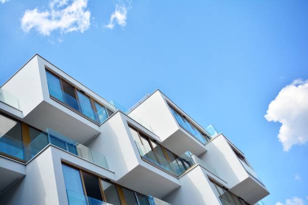 istock Modern apartment buildings on a sunny day with a blue sky. 1154543525
