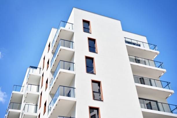 istock Modern apartment buildings on a sunny day with a blue sky. 1154543541