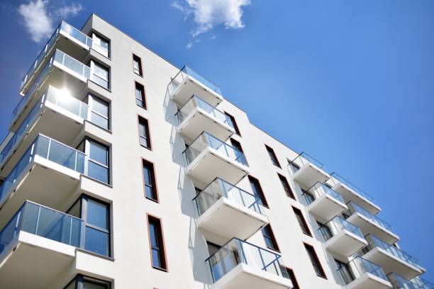 istock Modern apartment buildings on a sunny day with a blue sky. 1154543558