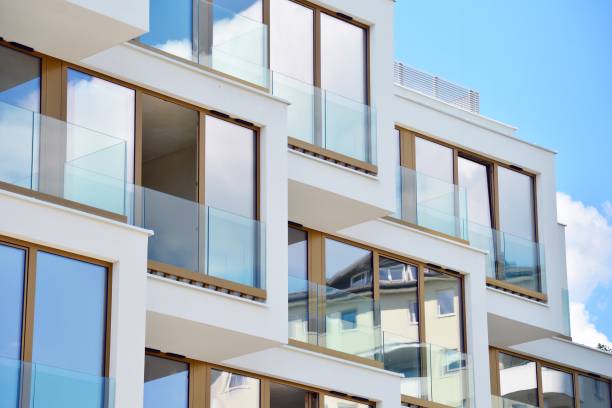 istock Modern apartment buildings on a sunny day with a blue sky. 1154543590