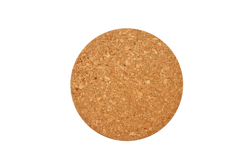 Empty round cork coaster, isolated on white background. Top view image.