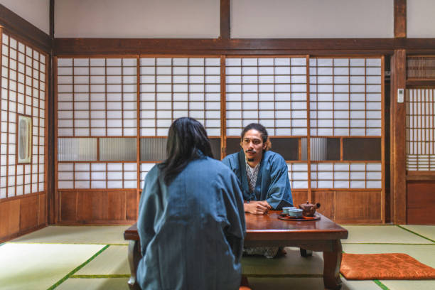 istock Mixed Race Guests at Tokyo Ryokan 1154550081