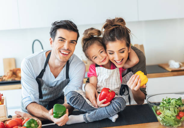 istock Happy family in the kitchen 1154551132