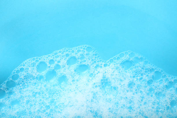 istock Background soap suds (foam) and bubbles from detergent. House cleaning concept 1154552178