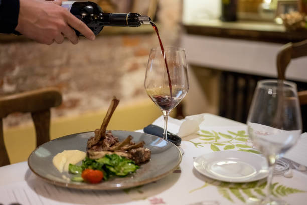 istock Fine dining with lamb ribs and red wine 1154552821