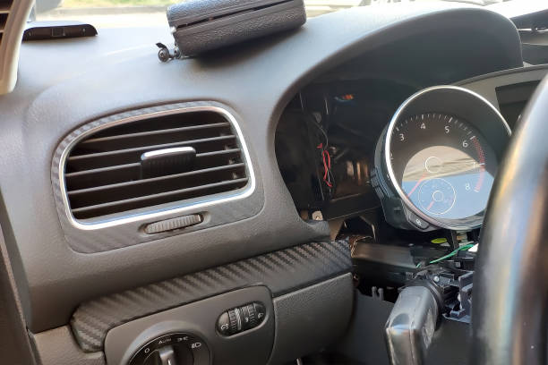 istock Installing a security alarm in a modern car for the dashboard. GSM security system 1154556962