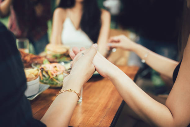istock Family people praying before Thanksgiving dinner at home. 1154564953