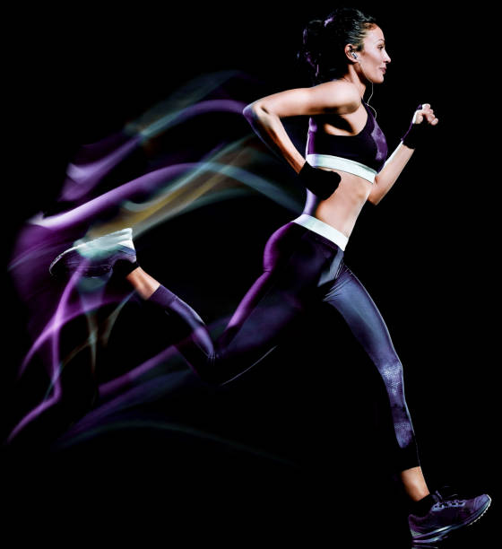 istock beautiful woman runner jogger jogging running isolated black background 1154570689