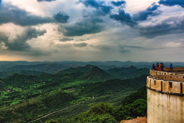 Monsoon Palace Tower and the Aravalli Range A beautiful and luxuriant landscape in the hills of Rajasthan, India monsoon stock pictures, royalty-free photos & images