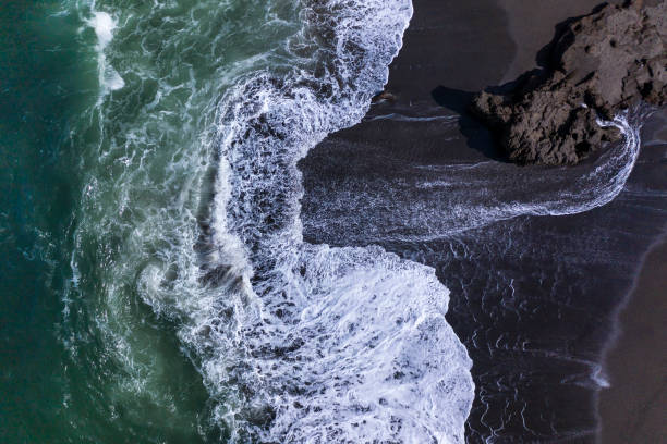 istock Powerful waves breaking along the shoreline in Bali 1154580705