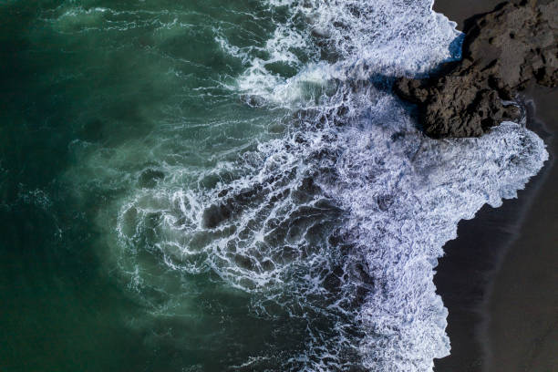 istock Powerful waves breaking along the shoreline in Bali 1154580735