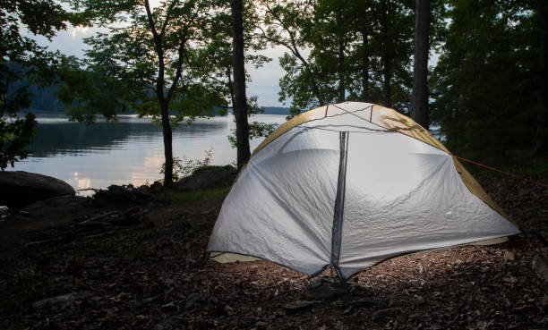 istock Tent pitched next to a lake in North Carolina 1154583210