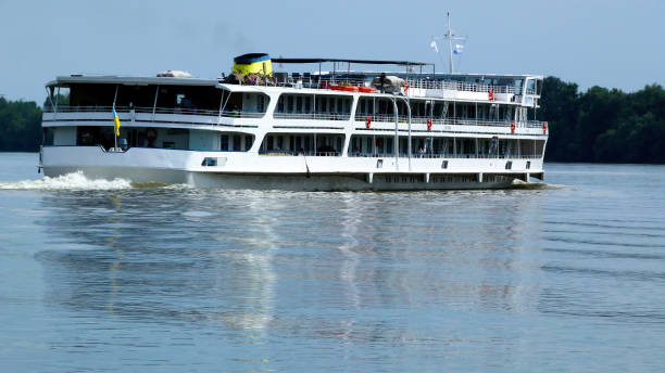 istock large white tour boat or cruise ship on the blue Danube 1154585793