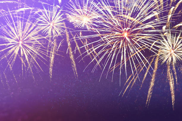 istock bright, colorful New Year's fireworks on an interesting abstract background with stars and beautiful bokeh 1154585903