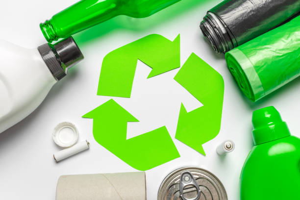 istock Eco concept with recycling symbol on table background top view 1154587440