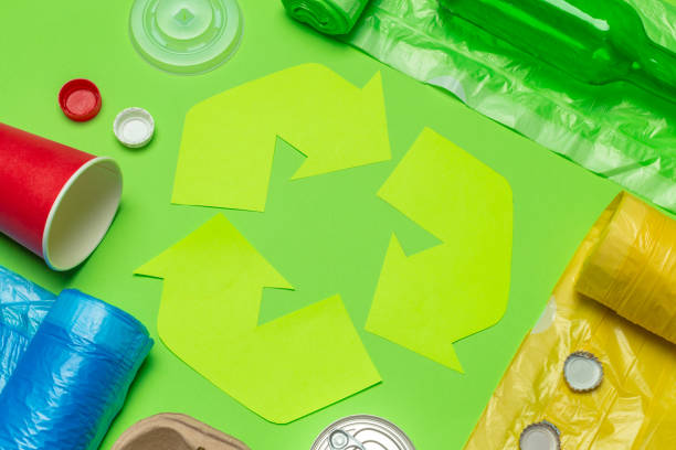 istock Eco concept with recycling symbol on table background top view 1154587469