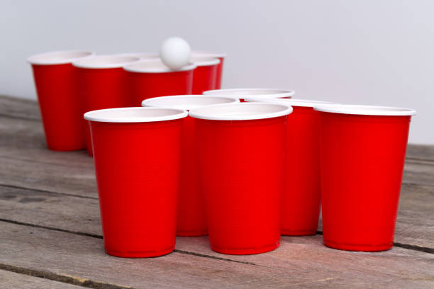istock Game Beer Pong on wooden table 1154587534