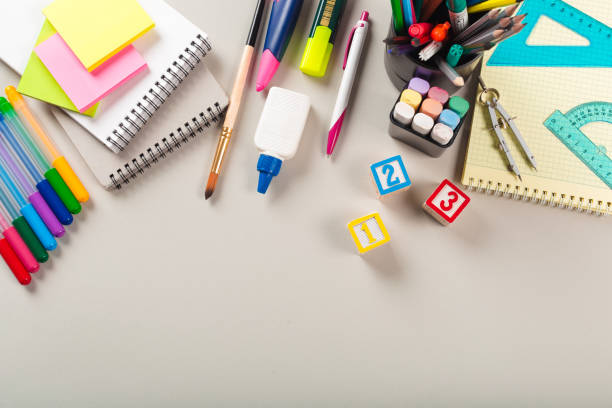 istock School and office supplies. Top view. 1154587542