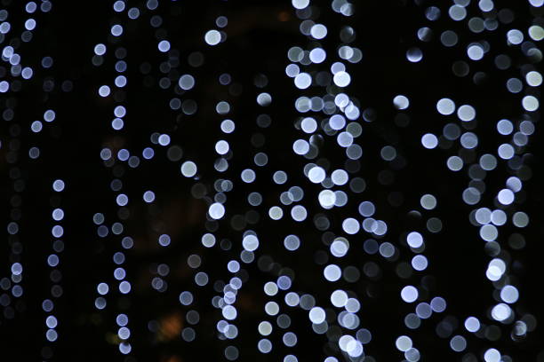 istock Lighting magic background blurred bokeh cycle light night, merry Christmas and happy New Years bokeh light picture, blur light for decoration Restaurant wall Night 1154587895