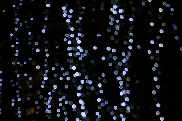 istock Lighting magic background blurred bokeh cycle light night, merry Christmas and happy New Years bokeh light picture, blur light for decoration Restaurant wall Night 1154587900