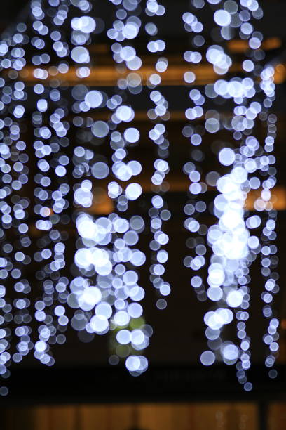istock Light line blurred bokeh background, Night lights decorated restaurant, Light for decoration department store in merry Christmas and happy New Years festival, lifestyle night lighting bokeh 1154590048
