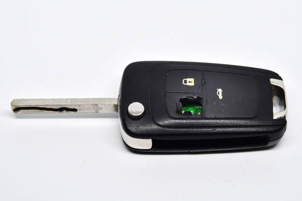 istock Damaged car key isolated on white 1154590049