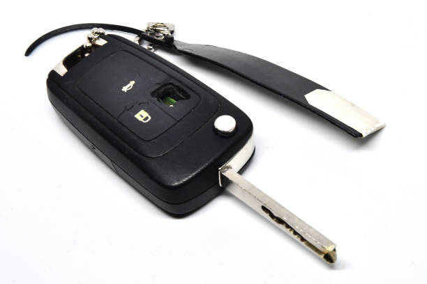 istock Damaged car key isolated on white with copy space 1154590050