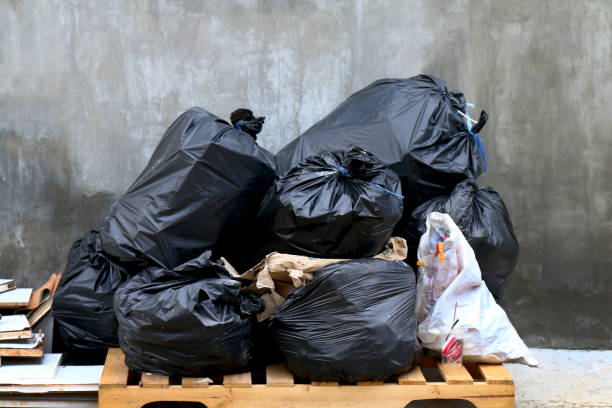 istock pile of waste garbage plastic black and trash bag stack waste many 1154596358